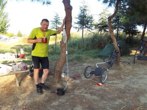 David, next to our water filtering system, which works very well.